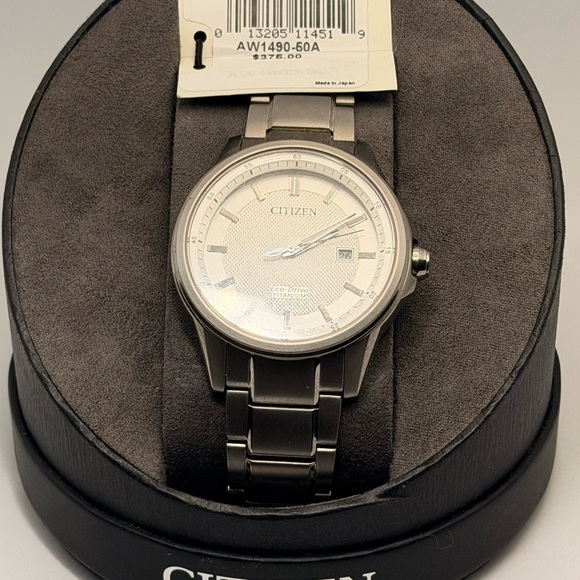 CITIZENS - NEW MENS TITANIUM ECO DRIVE AW1490-50A